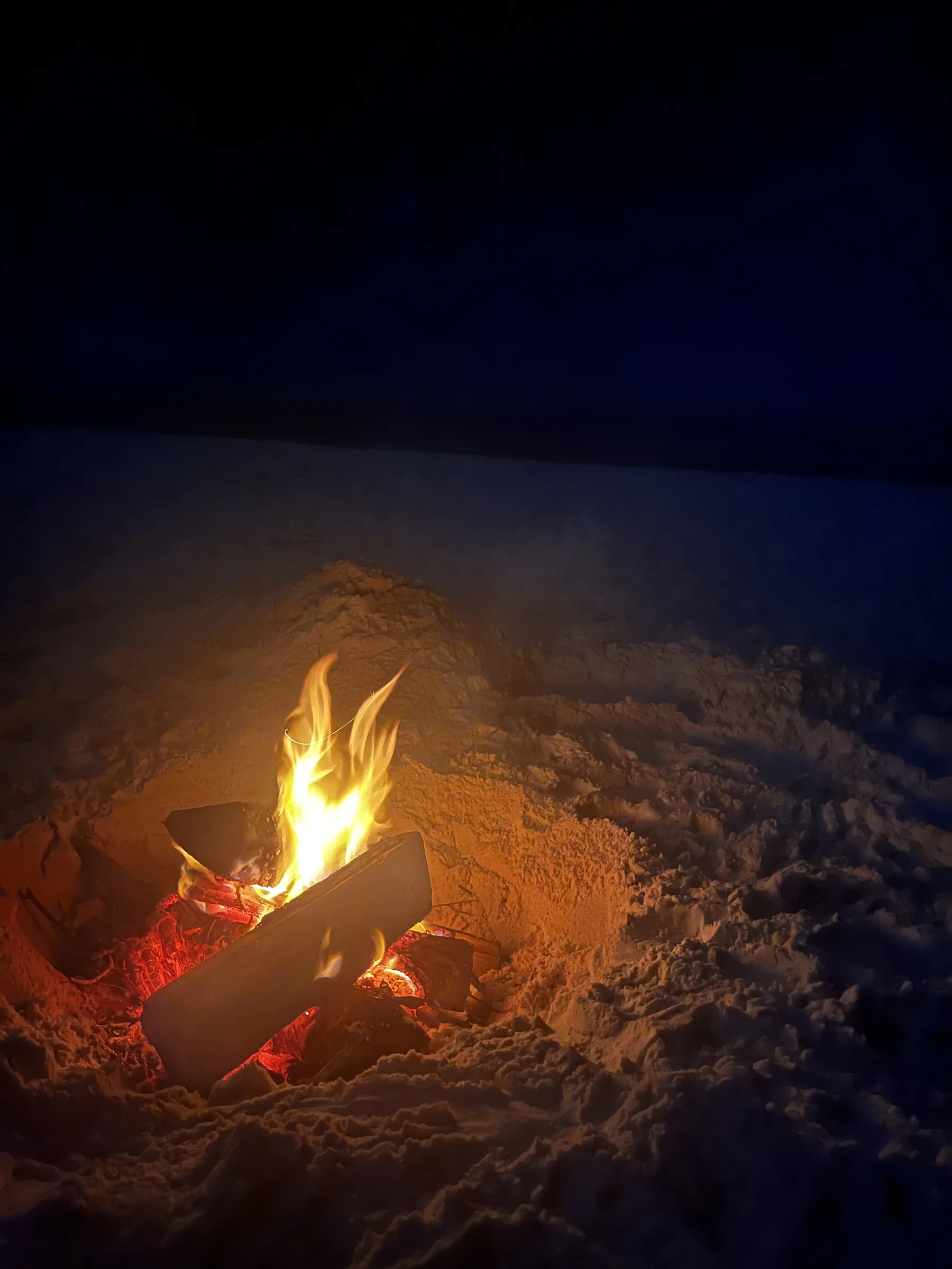 Small beach fire on the sand at night, Cape San Blas, Florida
